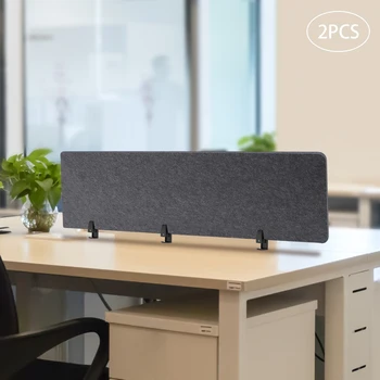 Магазин Stand Up Desk Store переориентирует необработанную акустическую панель-перегородку, установленную на рабочем столе, для уменьшения шума и визуальных отвлекающих факторов.